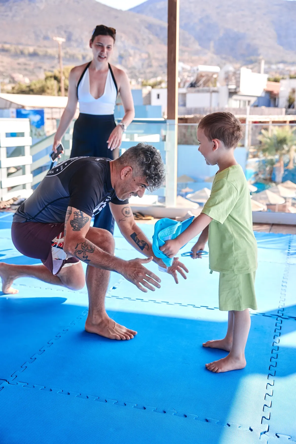 Instructor showing a BJJ technique