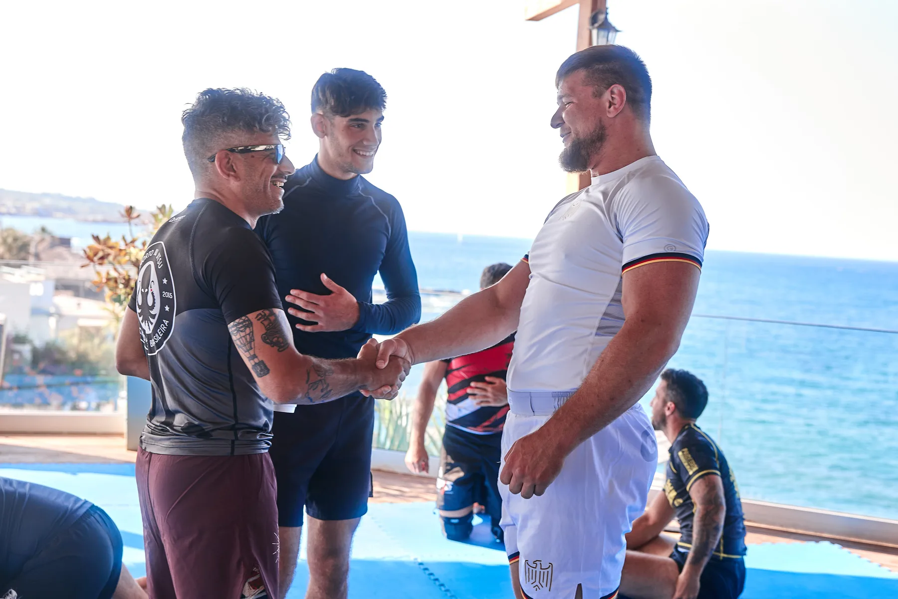 BJJ camp drilling on the mat